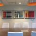 Sleek meeting room with complimentary art