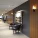 Seating with sconces and painting