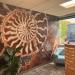 Wall printed with large nautilus fossil design