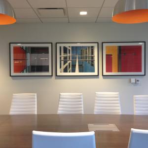 Sleek meeting room with complimentary art
